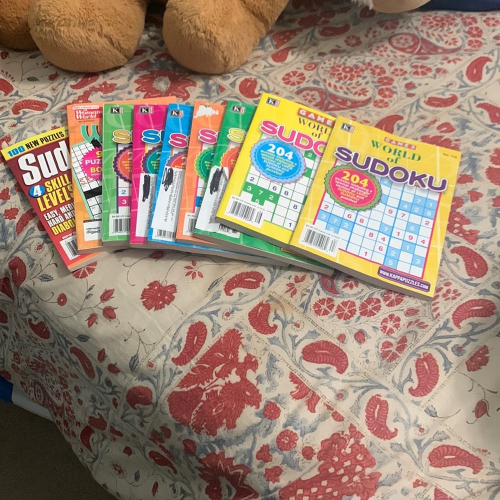 8 sudoku puzzles  1 crossword puzzle unused